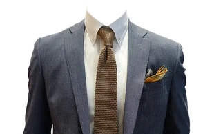 К чему снится костюм